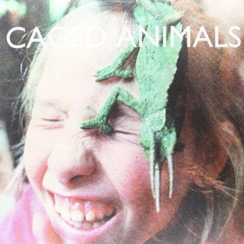 Caged Animals - IN THE LAND OF GIANTS | Vinyl
