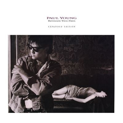 Paul Young - Between Two Fires (180G) [Flame Red Vinyl] [2LP] | Vinyl